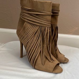 Tan fringed heels